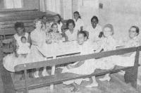 Missionaries and residents at their weekly meeting, Palm Island, QLD (c1966)