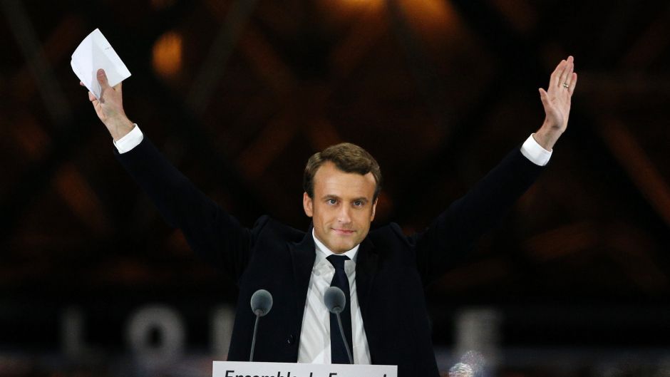 French President-elect Emmanuel Macron gestures during a victory celebration outside the Louvre museum in Paris, France,
