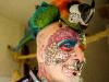 Man cuts off his ears to look like a parrot