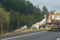 A truck, mostly carrying oranges, rolled on the Bruce Highway.