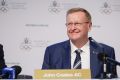 John Coates fronts the media after his re-election to the top of the AOC board.