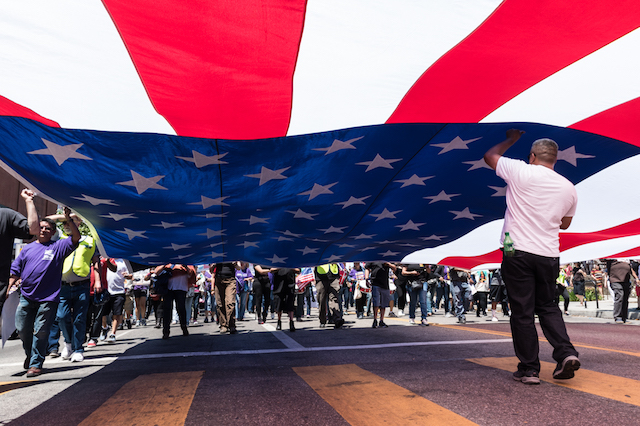 Photos: 15,000 Angelenos March For Immigrant And Workers' Rights