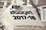 Budget documents sit inside cloth bags during the budget lock-up at Parliament House in Canberra, Australia, on Tuesday, ...