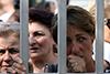  Relatives of inmates stand outside prison to see family in Tibilisi, Georgia. Georgia has made great strides in improving prison conditions via OPCAT membership.© EPA/ZURAB KURTSIKIDZE