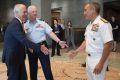 Chief of the Defence Force Mark Binskin, centre, introduces the PM to the US Pacific Command's Admiral Harry B. Harris Jr.