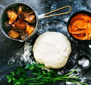 Char-grilled calzone stuffed with ajvar and slow-cooked pork.