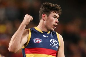 Mitch McGovern celebrates after kicking a goal during the round 23 match between the Crows and the West Coast Eagles.