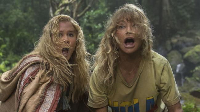 This image released by 20th Century Fox shows Goldie Hawn, right, and Amy Schumer in a scene from "Snatched." (Justina Mintz/20th Century Fox via AP)