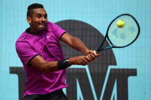 Nick Kyrgios plays a backhand in his match against Ryan Harrison of USA during day five of the Mutua Madrid Open.