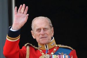  Prince Philip, Duke of Edinburgh waves from the balcony of Buckingham Palace after the Trooping the Colour parade.