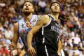 Melbourne United's Josh Boone (right) just finished his season in Hong Kong.