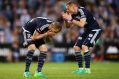 Devastated: James Troisi and Besart Berisha lament a missed shot on goal