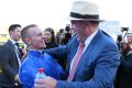 Happy days: John O'Shea and Zac Purton after It's Somewhat's Doncaster win earlier this month.