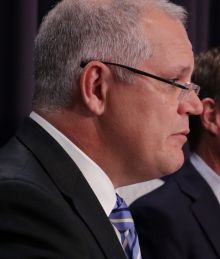 Treasurer Scott Morrison and ministers Christian Porter and Simon Birmingham spruik their omnibus savings plan at ...