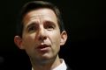 Minister for Education and Training Simon Birmingham will introduce the government's school funding changes into ...