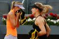 No love lost: Maria Sharapova and Eugenie Bouchard were all business in their Madrid Open clash.