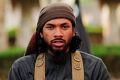 Neil Prakash, aka Abu Khalid al-Cambodi, in a still from an IS propaganda video.