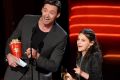 Hugh Jackman and Dafne Keen accept the MTV award for best duo.