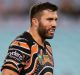 Forgettable night: James Tedesco looks dejected at full-time.