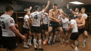 Off the mark: Toronto Wolfpack players celebrate in the locker room after their 62-12 win over Oxford.