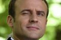 French President-elect Emmanuel Macron, right, and outgoing President Francois Hollande mark the anniversary of the ...