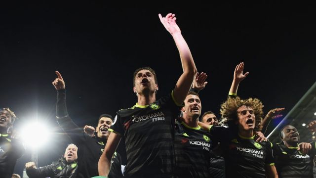 Champions: The Chelsea team celebrate winning the league after beating West Brom.