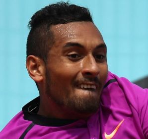 Nick Kyrgios plays a backhand in his match against Ryan Harrison of USA during day five of the Mutua Madrid Open.