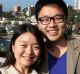 Winning bidders April Li and Jeremy Li on the balcony of their new home at 52/106 High Street, North Sydney.