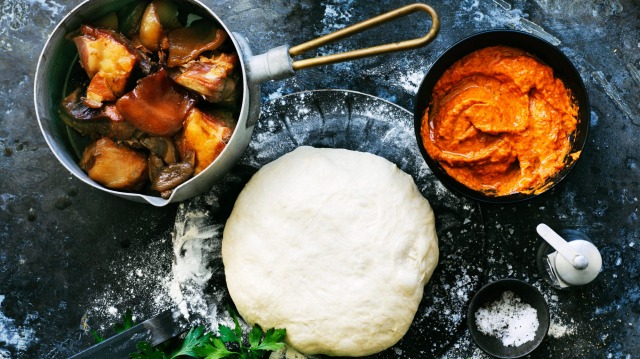 Char-grilled calzone stuffed with ajvar and slow-cooked pork.