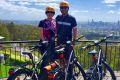 Samantha and Nick Willis from Electric Bikes Brisbane with their electric bicycles.