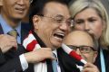 Chinese Premier Li Keqiang and PM Malcolm Turnbull at an AFL match between the Sydney Swans and the Port Adelaide in March.