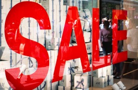 Sale signs litter Sydney's Pitt Street mall as retailers slash prices to lure shoppers.
