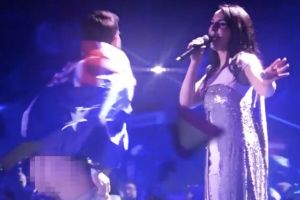 An Australian streaker has interrupted the Eurovision Song Contest.