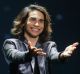 Isaiah Firebrace from Australia is introduced during the Final for the Eurovision Song Contest.