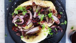 Cuttlefish braised in red wine.