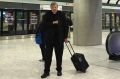 Cardinal Pell at London's Heathrow Airport.