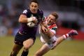 Full flight: Billy Slater in action. 