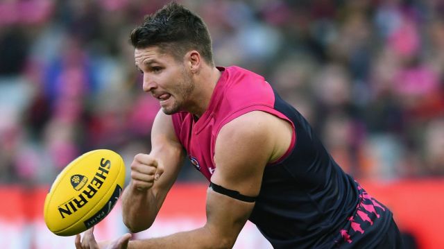 Determined to play on: Melbourne's Jesse Hogan.