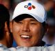 South Korea's Si Woo Kim celebrates on the 18th green after winning The Players Championship.