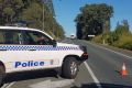 The Mount Lindesay Highway remained closed into the afternoon, following a fatal eight-vehicle crash at Woodhill just ...