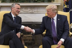 File - President Donald J. Trump and NATO Secretary General Jens Stoltenberg shake hands during their meeting at the White House, April 12, 2017.