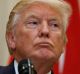 President Donald Trump listens as Turkish President Recep Tayyip Erdogan speaks in the Roosevelt Room of the White House ...