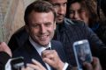 Emmanuel Macron, French presidential candidate, meets with supporters during an election campaign event in Rodez, ...