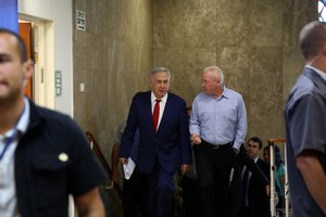 Israeli Prime Minister Benjamin Netanyahu, left, and Housing Minister Yoav Galant, arrive for the weekly cabinet meeting at the Prime Minister's office in Jerusalem, Sunday, May 15, 2016.