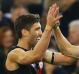 David Myers celebrates a goal with Joe Daniher on Saturday night.