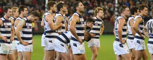 MELBOURNE, AUSTRALIA - MAY 13: Cats players looks dejected after defeat during the round eight AFL match between the ...