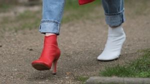 A guest wears the Celine mismatched shoes at the Chanel show during Paris Fashion Week in March. 