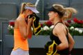 Maria Sharapova wipes the sweat away during her match against Eugenie Bouchard