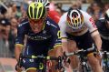 Caleb Ewan, centre, crosses the line to win the seventh stage of the 100th Giro d'Italia.