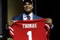 Stanford University star Solomon Thomas poses after being selected by the San Francisco 49ers.